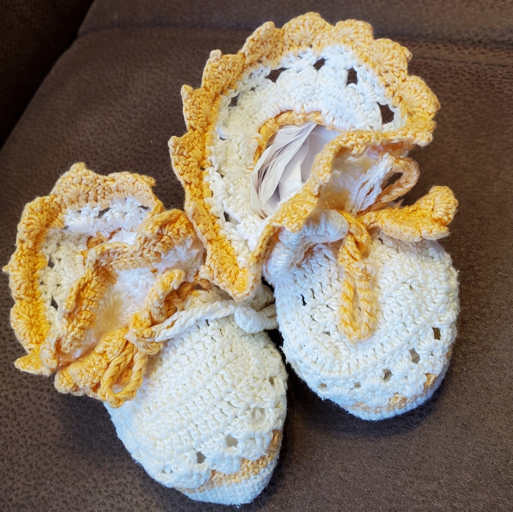 Vintage hand crocheted baby booties orange and cream
